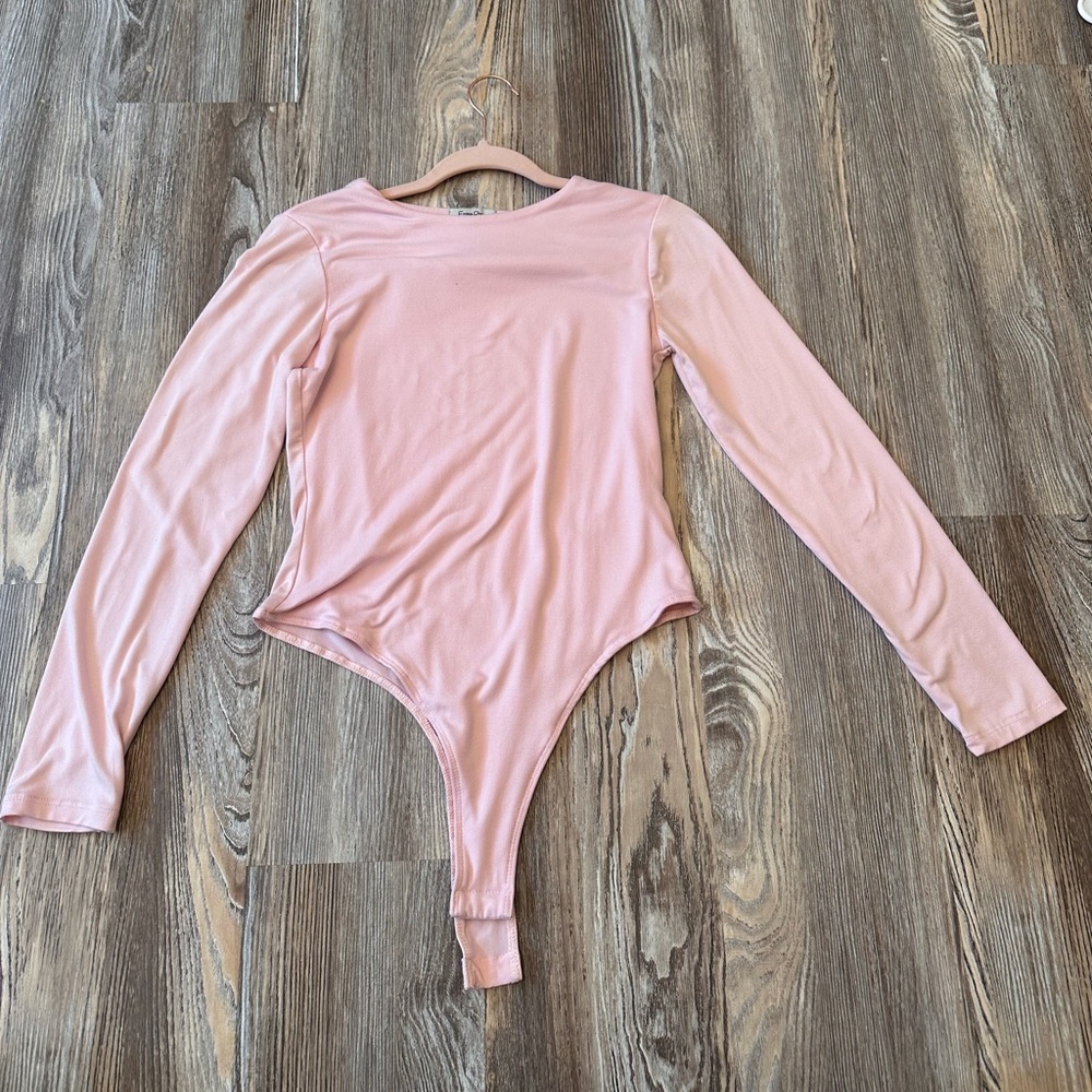 pink long sleeve body suit